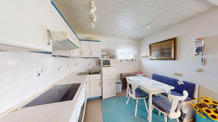 Eigentumsgrundstück mit Ferienbungalow mit Wasserblick in Drigge auf der Insel Rügen